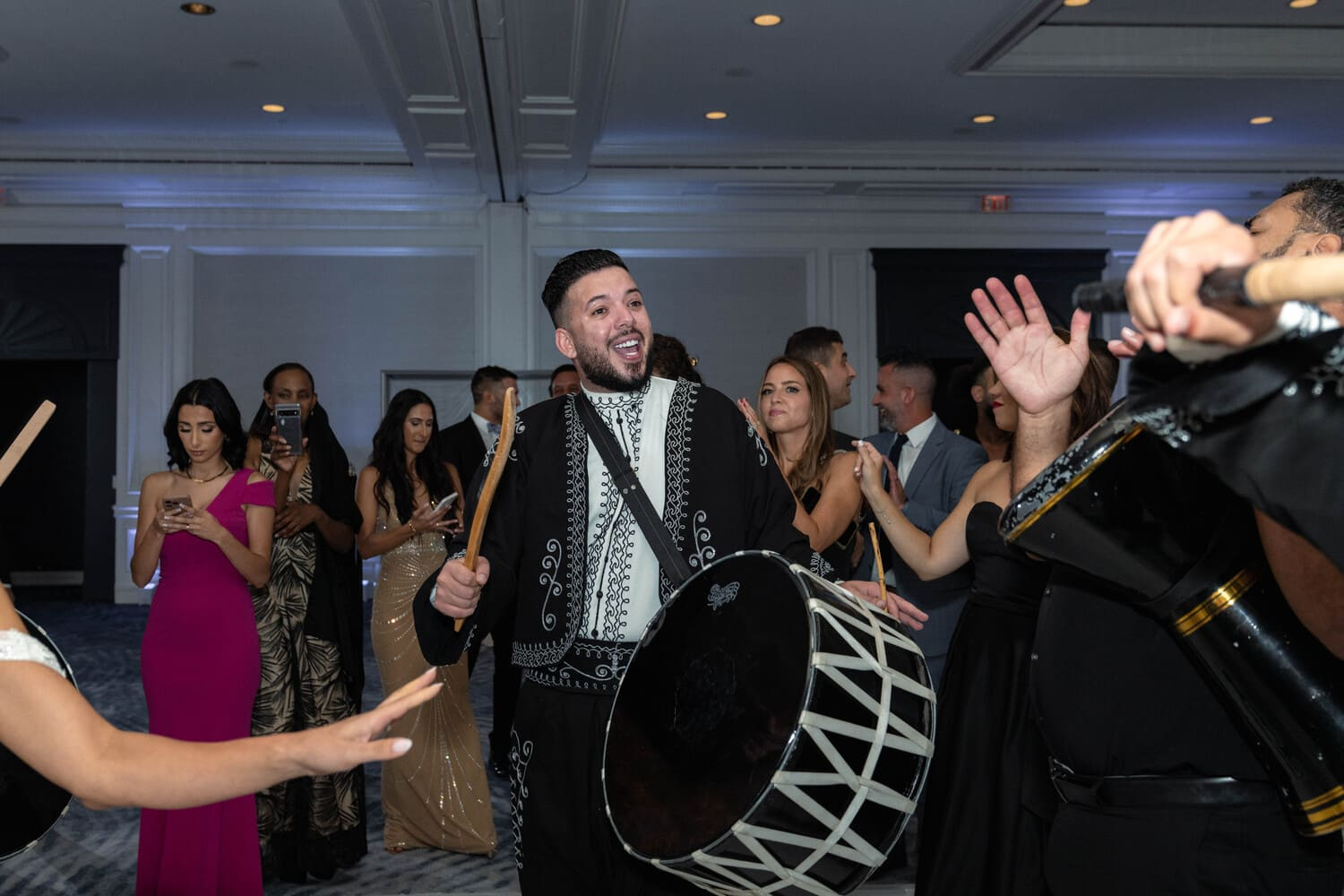 Zaffa drummers leading the couple into the ballroom