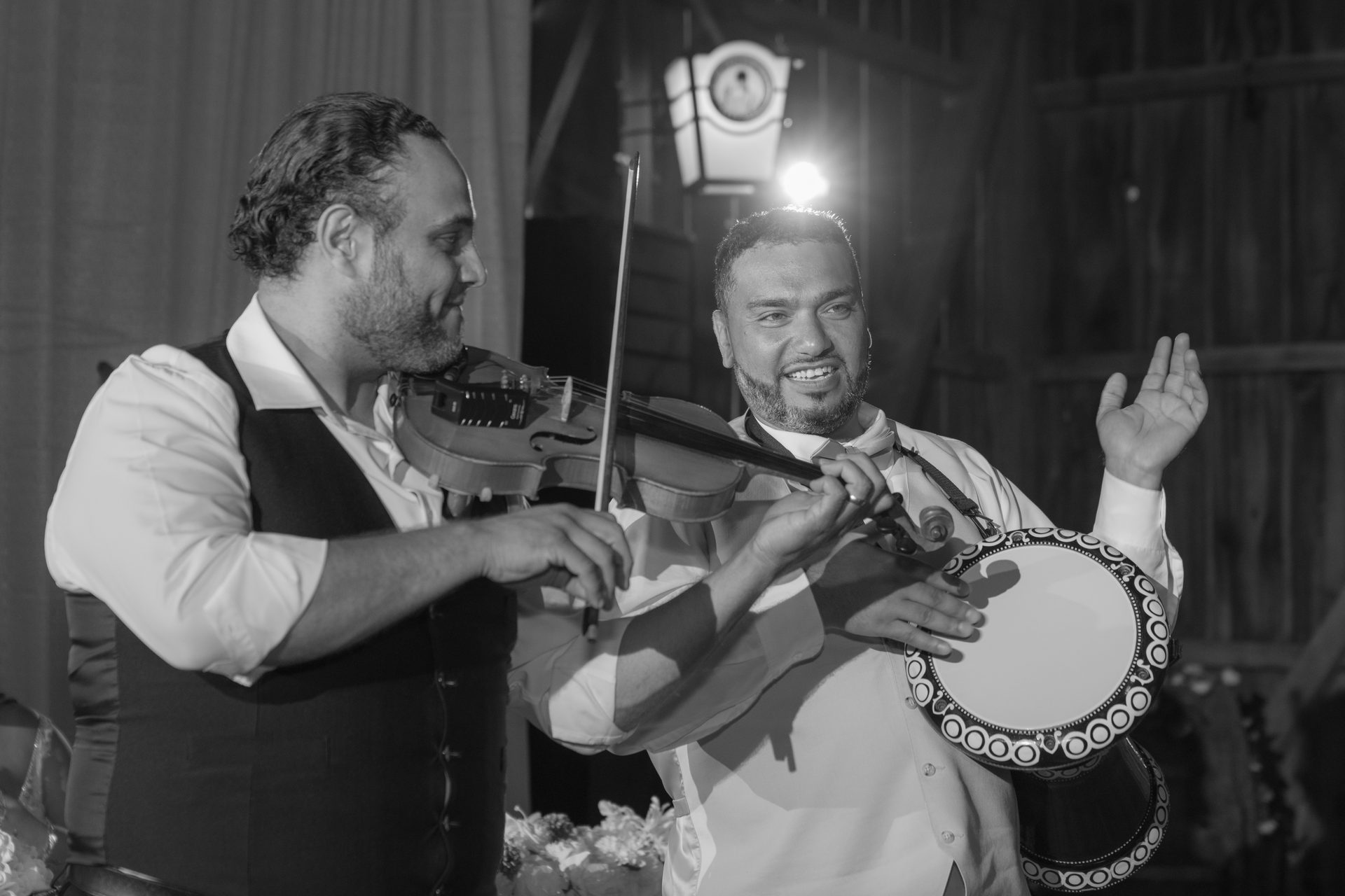 Black and white shot of the ZEO duo mid-performance