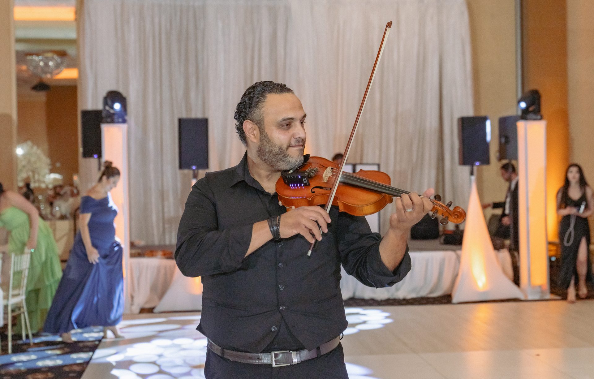 ZEO violinist performing during the reception