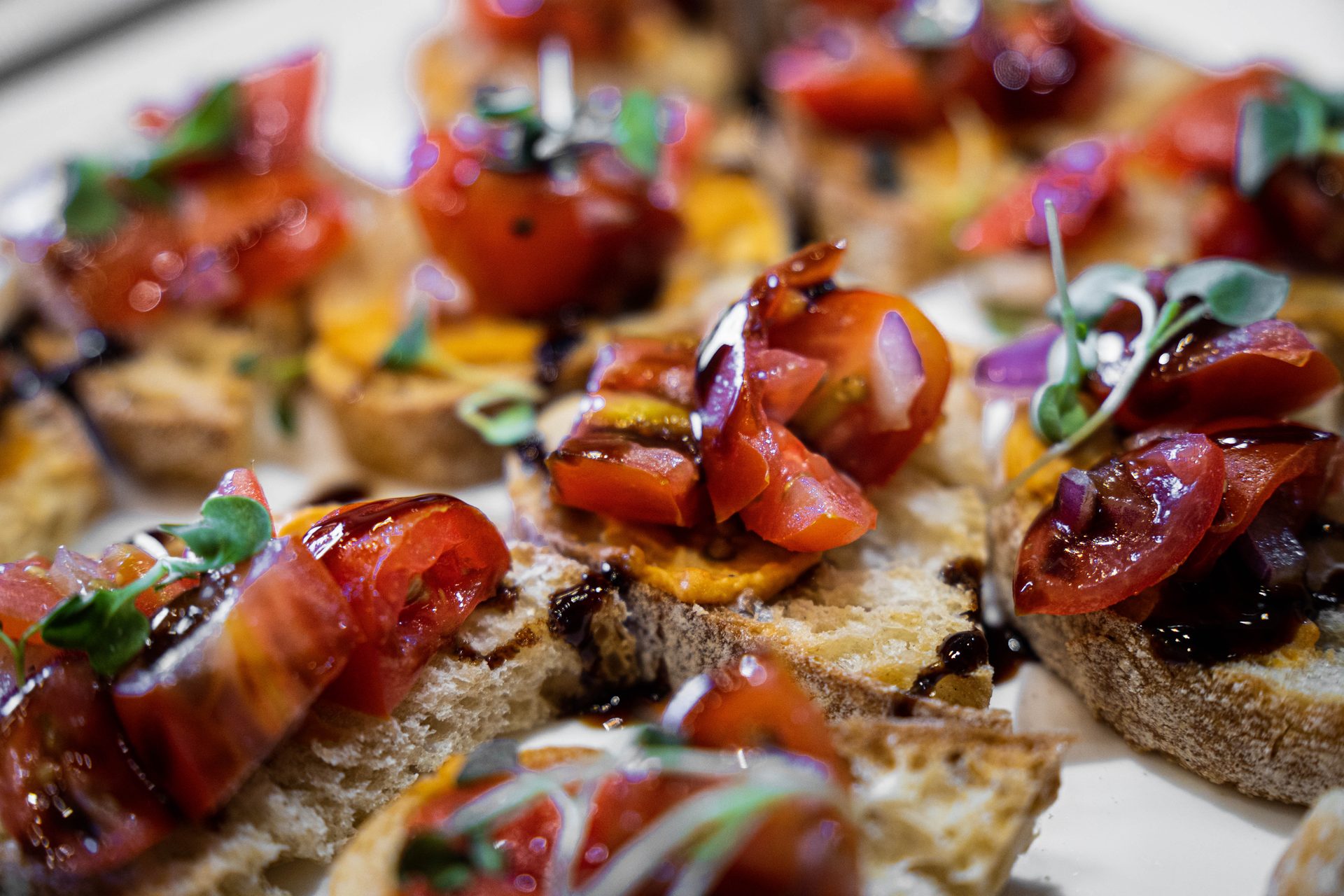 Tomato bruschetta with balsamic and microgreens