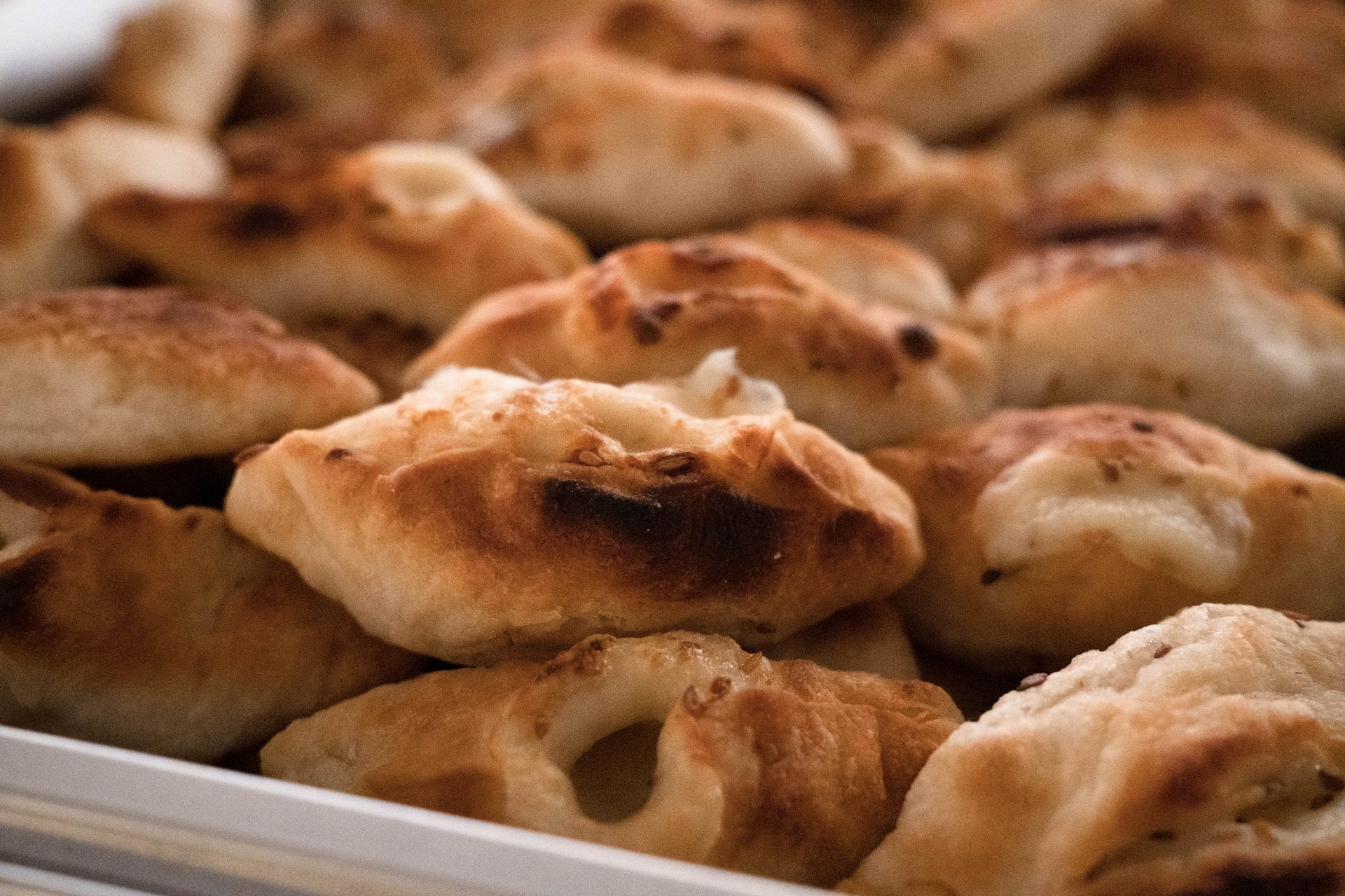 Golden sfeeha meat pies fresh from the oven