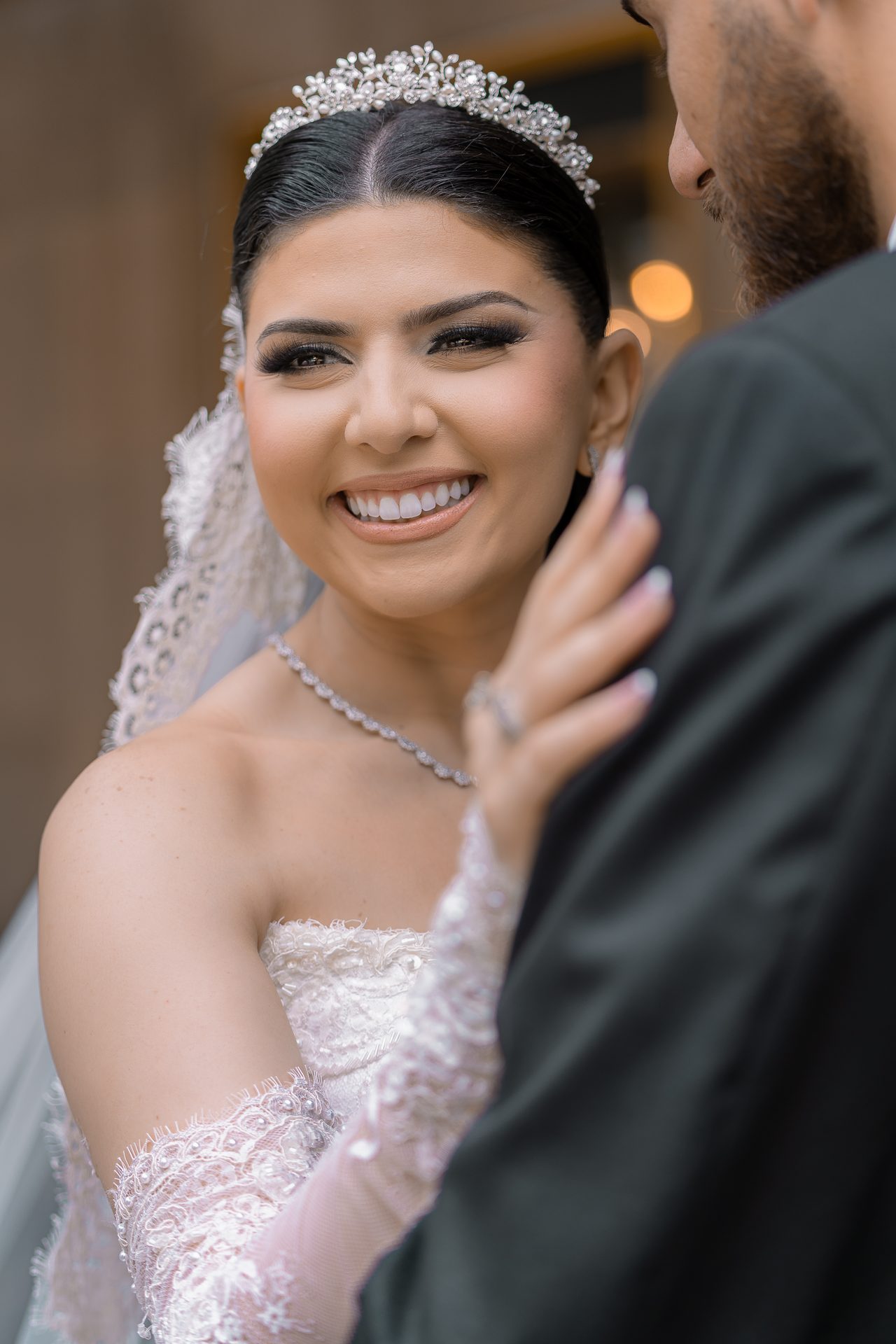 Photography hero: bride portrait in soft natural window light, editorial framing